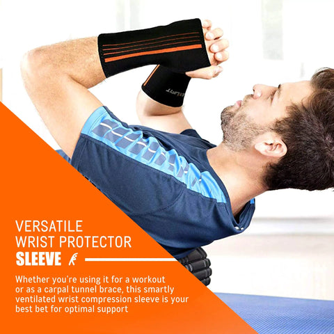 Man wearing wrist and forearm compression sleeve for carpal tunnel and joint pain relief, small adjustable support brace.