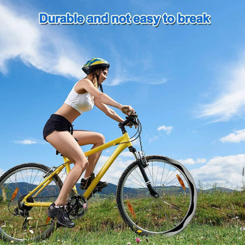 Cyclist riding a mountain bike showcasing Two Pack 26 Inch Self Sealing Bike Tubes With 32mm Schrader Valve Puncture Resistant Inner Tubes