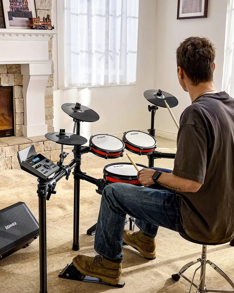 Man playing Electronic Drum Set With Bluetooth And Melodics Lessons, 450 Sounds, USB MIDI, 5 Pads And 3 Cymbals