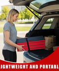 Person loading Foldable Mechanic Mat 46.46 Inches By 19.29 Inches Extra Large Beefy Heavy Duty Cushion Pad into car trunk