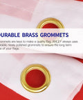 Close-up of Fly Breeze 3x5 Foot American National Flag with fade proof colors, showing brass grommets on canvas header.