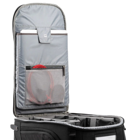 Open Walker Pro Rolling Camera Backpack showing foam-padded customizable compartments and smooth rolling wheels