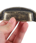 Close-up of Vintage Metal Shell Cabinet Door Handles Set, Antique Bronze Drawer Pulls for Kitchen Cupboard Wardrobe, European Style Hardware.