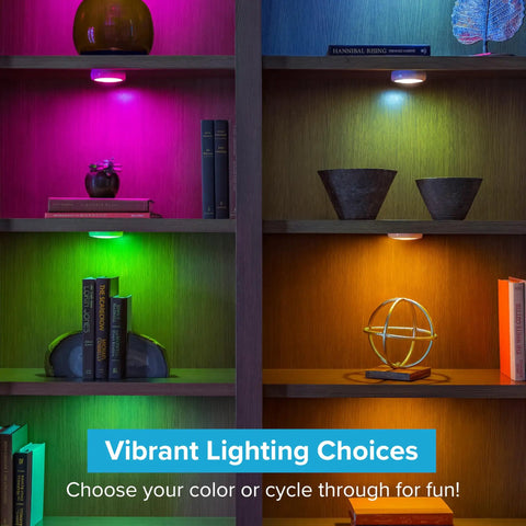 Wireless RGB LED Puck Lights Kit With Remotes illuminating shelves with vibrant colors