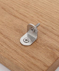 Heavy Duty 40 Piece Stainless Steel L Bracket Set With Screws For Wooden Surfaces shown on wood