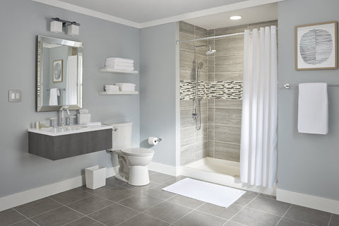 Modern bathroom with Orbit Undercounter Bathroom Sink in White Vitreous China, gray tiles, and shower area.