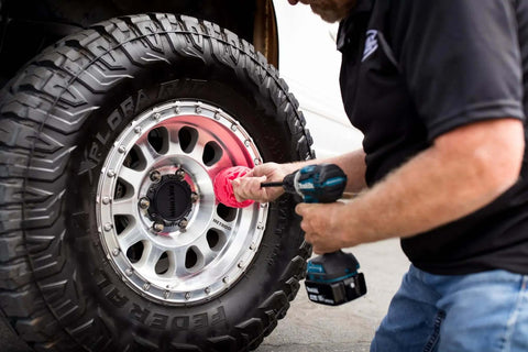 Person using PowerBall 2 Polishing Tool For Deep Dish Wheels And Tight Areas Drill Powered With A 10 Inch Quick Swap Bit