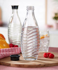 Glass Carafe Set For Sparkling Water Makers Pack Of 2 For Aqua Fizz Penguin Or Crystal Machines on wooden board with fruits