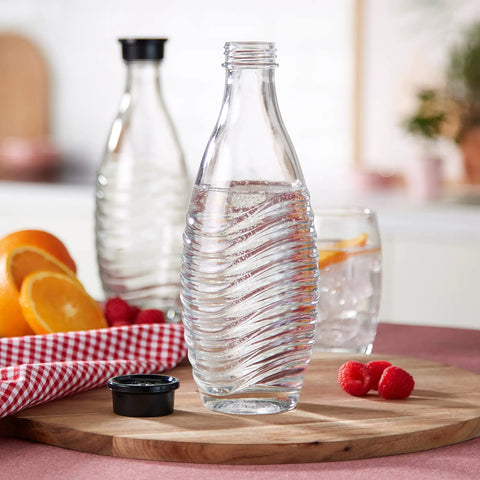 Glass Carafe Set For Sparkling Water Makers Pack Of 2 For Aqua Fizz Penguin Or Crystal Machines on wooden board with fruits