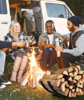 Group sitting by campfire with Curved Firewood Rack And Holder For Indoor And Outdoor Use 22 Inch Built Tough Heavy Duty