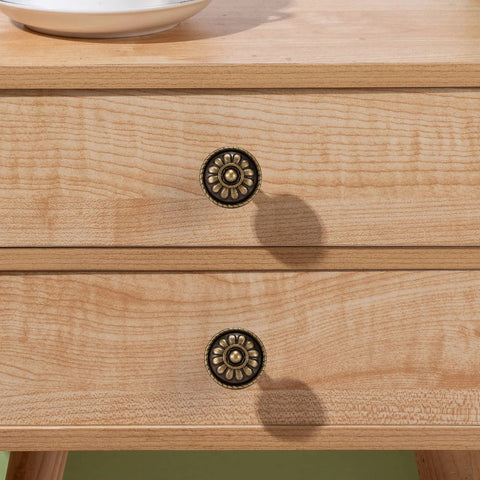 Antique Brass Cabinet Knobs 10 Pack Solid Zinc Alloy Vintage Drawer Knobs For Dresser Nightstands Single Hole Hardware 1.25 Inch Diameter Rust Resistant Antique Finish Premium Quality installed on wooden drawers.