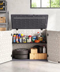 20 Cu Ft Outdoor Storage Cabinet With Adjustable Shelf And Lockable Doors holding tools and supplies in a garage setting.