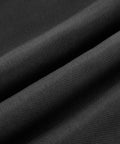 Close-up of black linen fabric designed for Queen Size Upholstered Bed Frame With Built In Charging Station, Black Linen Platform Bed.