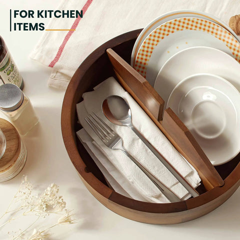 Premium 12 Inch Acacia Wood Lazy Susan Rotating Tray With Four Removable Dividers High Rim Kitchen Spice Rack Snack Divider Smooth Turn Total Game Changer Tabletop Display holding cutlery and napkins.