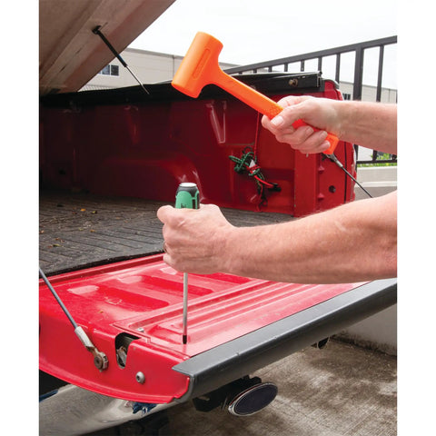 Three Piece Dead Blow Hammer Set With Brass Cap Hammer 12 Oz Ball Peen 16 Oz And 24 Oz Dead Blow Urethane Coated Orange Hammers Non Sparking Brass Cap Steel Face And Peen For Punches Chisels And Metal Shaping in use on a truck bed with a screwdriver