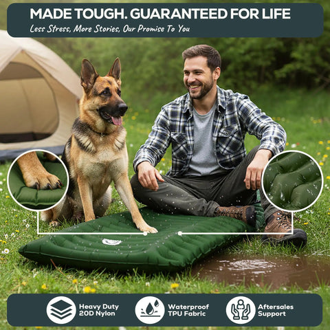 Man and dog sitting on Ultralight Camping Sleeping Pad 17.5 Oz compact inflatable mattress in green field near a tent