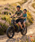 Dual Battery Adult Electric Bike With 956 Wh Juice And A Mean 1800W Motor Logging Ninety Miles on a dirt path with a man and child.