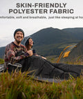 Couple enjoying nature with All Season Portable Sleeping Bag For Adults Teens And Kids Waterproof Lightweight With Compression Sack.