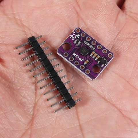 Close-up of Six Pack BMI160 6 Axis Accelerometer Gyroscope Gravity Sensor Module with PMU for I2C and SPI data in a hand.