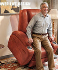Man sitting on Power Lift Recliner Chair For Elderly With Cup Holders And Side Pockets, Electric Lift Sofa, Leathaire Dark Brown Finish