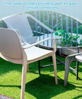 Pack Of Eight Clear Glass Table Bumpers With Solid Stems And Grippy Non Slip Bottoms That Slide Right Into Quarter Inch Holes in outdoor patio setting.