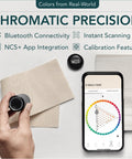 Bluetooth Color Reader For Designers, Instantly Scan And Match Colors, Then Share Swatches With A Portable Color Matching Tool, Includes Calibration Cap And USB Cable For Easy On The Go Color Work showing hand scanning fabric with app and calibration cap