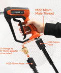 Hand holding Pressure Washer Gun And Hose Kit With 25 Ft Heavy Duty Hose And Replacement Wand 5 Nozzle Tips M22 Fitting