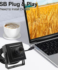1080P 120fps High Speed USB Camera With 12MP Sensor and 12mm Lens next to a laptop displaying wheat field