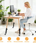 4 Pack Adjustable Table Leg Risers Featuring Smooth Rolling Casters Heavy Duty Metal Extenders in home office setup.