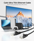10Gbps Snagless Cat6 Ethernet Cable 25ft Slim Profile Patch Cord connecting laptop and router, ideal for home or office networking