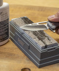 Honing Oil For Sharpening Stones 4oz Bottle Keeps Tools And Knives Slick Built In Stone Cleaning Agents And Rust Inhibitors Non Petroleum Oil That Prevents Clogging Pores Easy Stone Maintenance near sharpening stone and knife