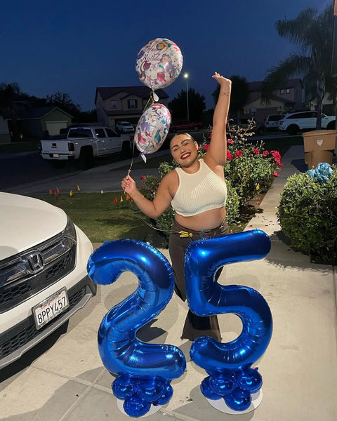 Woman celebrating with '25' Deep Navy Blue Number 2 Balloon, 40 Inch Giant Digit for Birthday Backdrop, Two Digit Party Decor