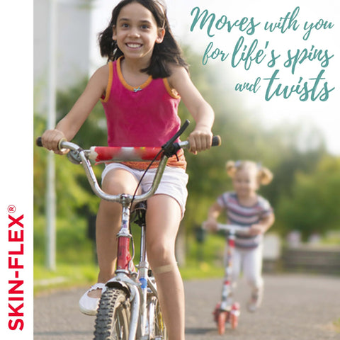 Band-Aid Skin-Flex adhesive bandages packaging label on left edge beside kids biking outdoors