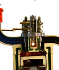 Close-up of Hands On 4 Stroke Diesel Hand Crank Engine Model For Education showing crankshaft and glow plug parts