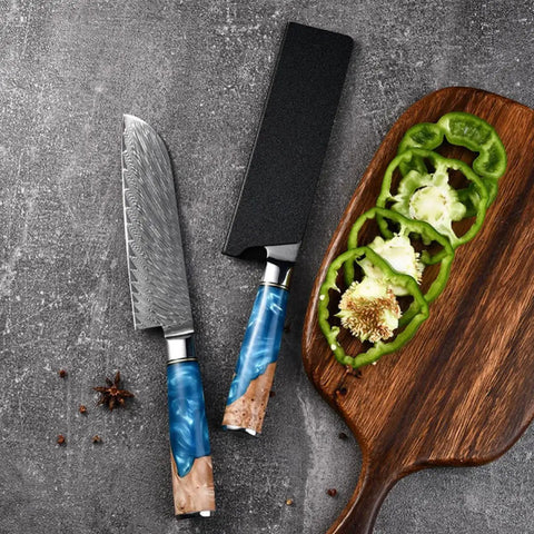 Knife with blue handle and sheath next to sliced green peppers on board, part of 5 Piece Cutter Protective Covers Set With Flocking Lining