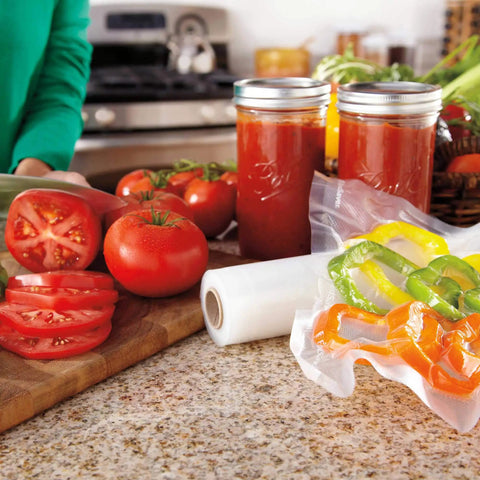 Custom Length Vacuum Sealer Bags Multipack Of 5 Count Rolls For Airtight Food Storage And Sous Vide on kitchen counter with vegetables