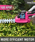 Slick Cordless Hedge Trimmer And Grass Shears 2 In 1 lightweight pink tool cutting through green bushes with efficient motor.