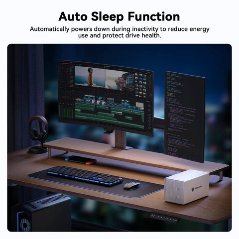 Four Bay USB C External Hard Drive Enclosure For 2.5 And 3.5 Inch SATA HDD Or SSD Drives on a modern desk with dual monitors.