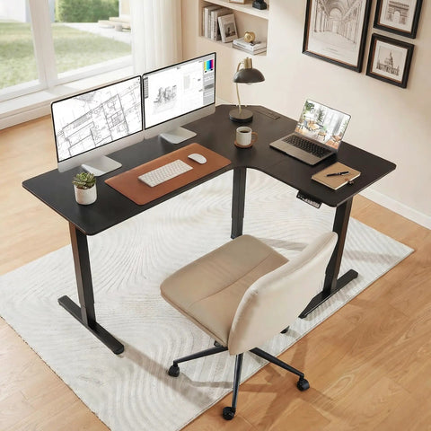 63-Inch L-Shaped Standing Desk With Built-In Power Outlets And Large Power Strip Holder, Black, in home office with monitors