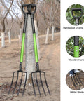 Heavy Duty Garden Fork 45 Inch Pitch Fork With Steel Tines And Comfortable Y Grip For Spading Digging Compost And Lawn Bed Work Four Metal Tines For Tough Soil against a tree backdrop.