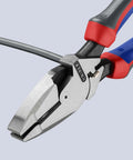 KNIPEX 9.5-inch ultra-high-leverage lineman's pliers, close-up of jaws, red and blue handles