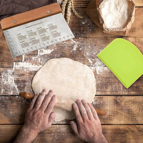 Dough Scraper and Bench Scraper Kitchen Tool Set in Stainless Steel with dough being rolled on wooden surface
