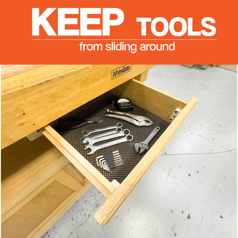 Heavy Duty Non Slip Rubber Mat 24 By 48 Inch For Woodworking Router Table And Workbench Anti Skid CNC Tool Mat Cabinet Shelf And Drawer Liner For Kitchen Or Garage Shop Storage installed in a drawer with tools.