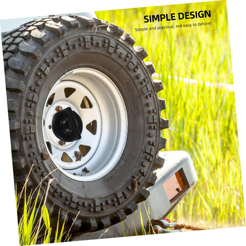 Spare Tire Hold Down Bolt Retainer Clamp For Cars And SUVs No Brainer Install shown securing a mounted spare tire on grass field