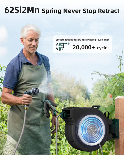Man using Retractable Garden Hose Reel 100 Feet One Half Inch With Pro Metal Shaft in garden, wall-mounted with hose extended.