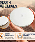 Person holding a Dead Simple Install Solid 7 Inch Cleanout Cover Plate Bright White Powder Coated Steel round cover with smooth edges.