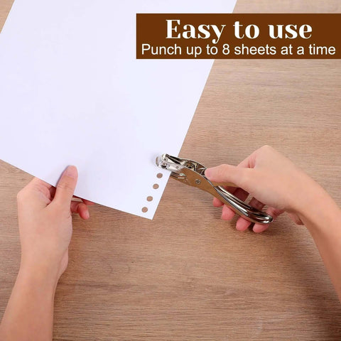 Using Twenty Piece Metal Handheld Single Hole Punch Set One Quarter Inch Eight Sheet Capacity Circle Paper Punch Tool on paper