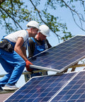 Two workers installing solar panels on a rooftop, focusing on sturdy setup for Five Piece Set Of Heavy Duty 15 Amp Solar Fuse Holders Inline With Class Two Overcurrent Guard To Keep Your Solar Rig Running Smooth Right Out The Gate.
