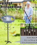 Outdoor Bird Bath That Doubles As A Feeder, Freestanding Garden Birdbath With Removable Bowl, 2 In 1 Design For Patios, Lawns, And Yards, Yard Ready, Durable 5 Prong Base, Easy To Clean, Grey shown in garden setup with woman holding garden tool