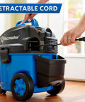 4 Gallon Wet Dry Vacuum With 5 Peak HP Two Stage Industrial Motor Workhorse Shop Vacuum, blue body, retractable cord in use.